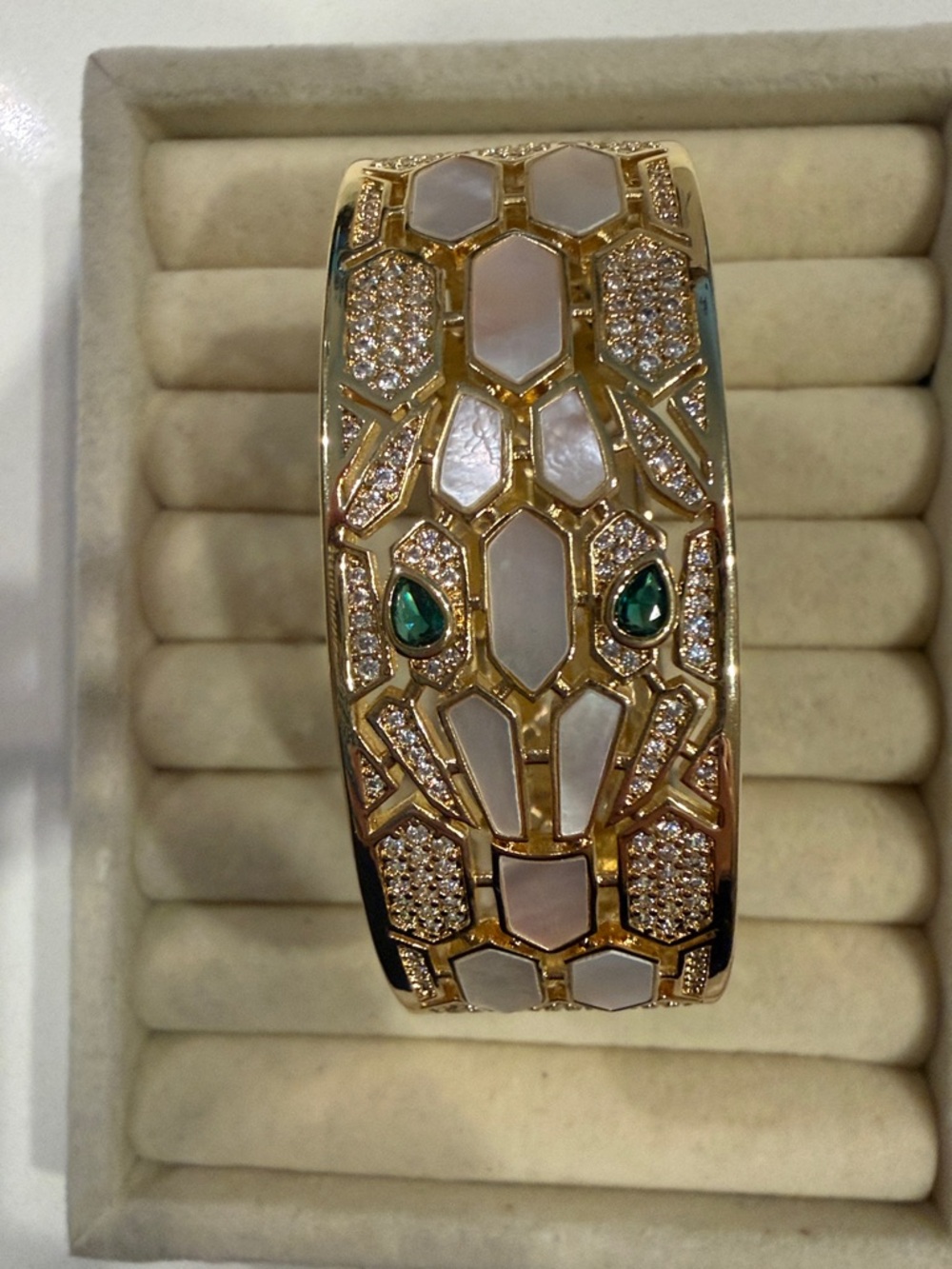 Gold-Tone Serpent Bangle Bracelet with Mother-of-Pearl and Emerald Accents pam